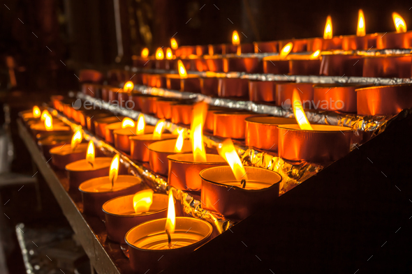 Group of Votive Candle in a Church Stock Photo by CreativeNature_nl